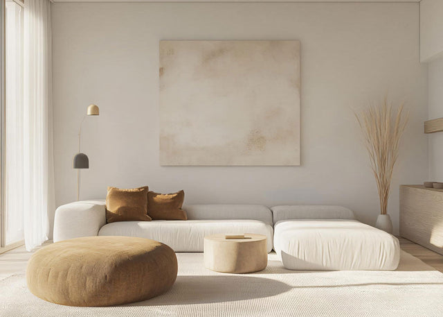 Living room wall decor ideas above a neutral sofa in a calm, minimalist lounge